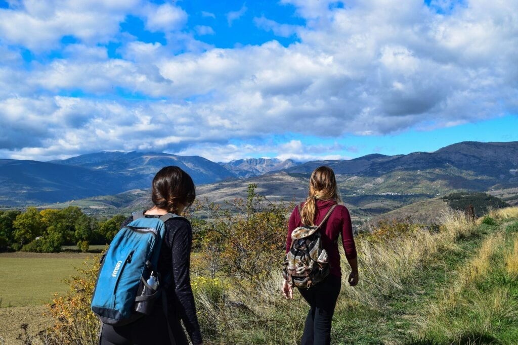Two Women Walks to Open Field